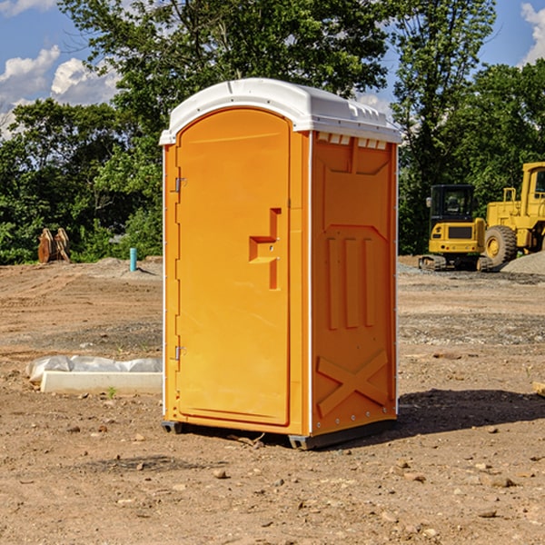 how often are the portable restrooms cleaned and serviced during a rental period in Hassell North Carolina